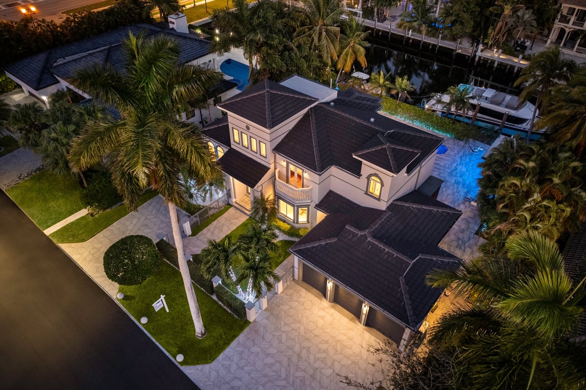 Aerial view of a luxury residence with private dock